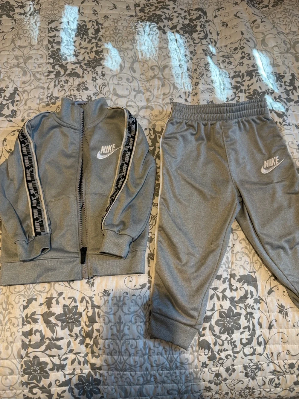Lot of two infant boys Nike track suits vgc 18 months.